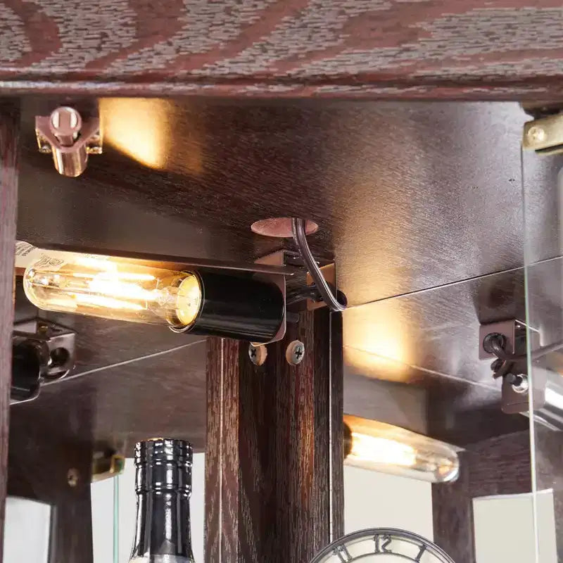 Vetrinetta ad angolo con illuminazione, adatta per soggiorni, collezioni di antiquariato, conservazione di vini o esposizione di bicchieri da bar. Legno di ciliegio scuro